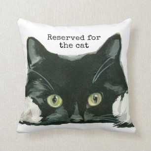 aufgehoben für die schwarze Katze des Kissen