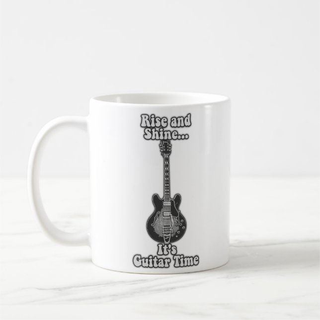 Aufstehen und leuchten. Es ist Gitarrenzeit. Schwa Kaffeetasse (Links)