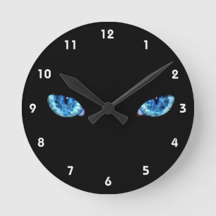 Augen auf schwarzem Hintergrund Runde Wanduhr