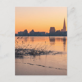 Aussicht auf Rostock bei Sonnenaufgang Postkarte