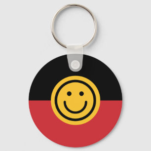 Australische Ureinwohner-Flagge mit Lächelgesicht Schlüsselanhänger