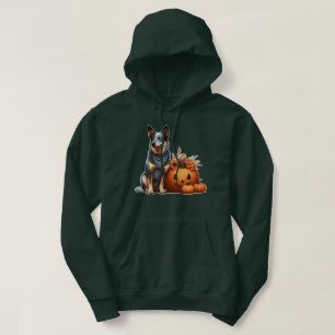 Australischer Rinderhund neben einem Jack-O-Lanter Hoodie