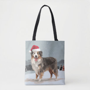 Australischer Schäferhund im Schnee Weihnachten