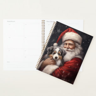 Australischer Schäferhund mit Weihnachten des Weih Planer