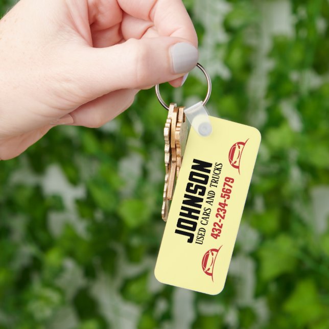 Autoverkäufer oder Gebrauchtwagenlohn Schlüsselanhänger (Hand)
