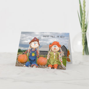 autumn scarecrows on hay bale karte