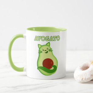 Avocado-Keton-Miezekatze-Katze, die an Ihnen Tasse