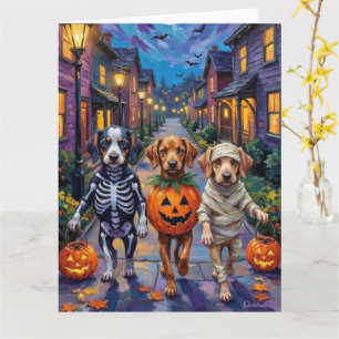 Azawakh-Hunde beim Trick-or-Treat in Halloween-Kos Karte
