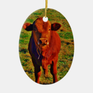 BABY BROWN COW EATING KERAMIKORNAMENT