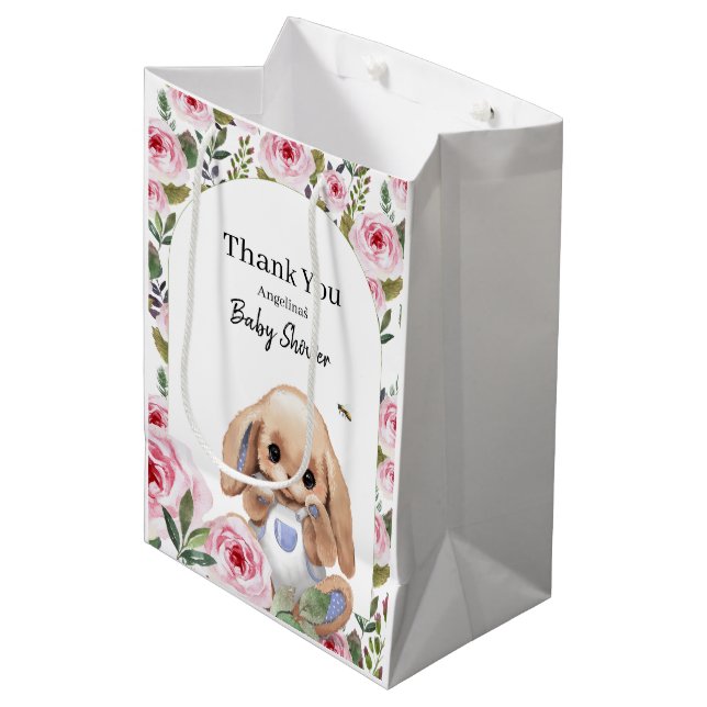 Baby Dusche Geschenktasche mit niedlichem Design. Mittlere Geschenktüte (Vorderseite Schrägansicht)
