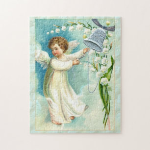 Baby Engel mit blauer Glocke Puzzle