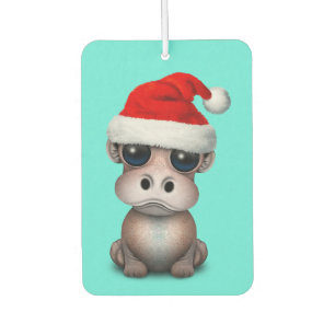 Baby-Flusspferd, das eine Weihnachtsmannmütze Autolufterfrischer