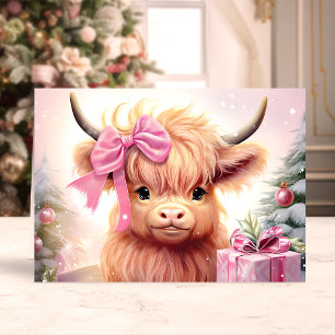 Baby Highland Kuh mit rosa Schleife Weihnachten