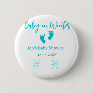 Baby im Winter duschen blaue Babyfüße Schneeflocke Button
