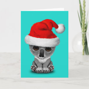 Baby Koala Tragen einer Weihnachtsmannmütze Feiertagskarte