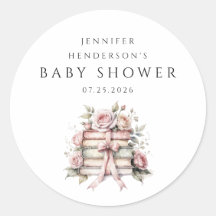 Baby Shower mit rosa Schleife und Bücherstapel