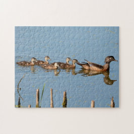 Babyenten in Folge des Mama Jigsaw Puzzle