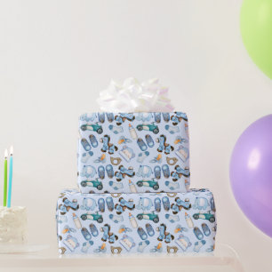 Babykleidung mit blauen Spielzeugbekleidungen Geschenkpapier