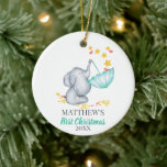 Baby's First Christmas Niedlich Elephant and Stars Keramik Ornament<br><div class="desc">Niedliche Weihnachtsschmuck für die ersten Weihnachtsfeiern, die Sie für einen einzigartigen Sake personalisieren können. Das Aquarelldesign besticht durch einen kleinen, süßen Elefanten, der in einem Schirm Stars und Liebe-Herzen fängt. Die Vorlage ist für Sie bereit, um Ihren Namen und das Jahr hinzuzufügen, das auf beiden Seiten des Ornaments gedruckt wird....</div>