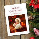 Baby's First Christmas Niedlich Santa Foto Red Feiertagskarte<br><div class="desc">Die erste Weihnachtskarte des Babys mit niedlichem Foto und rotem Typografie-Design. Mit der anpassbaren Rot-Schrift können Sie Ihren eigenen Text hinzufügen. Sie ändern auch das Foto mit Ihren eigenen,  um es einzigartig zu machen. Ideal,  um festliche Urlaubswünsche an Freunde und Angehörige zu senden.</div>