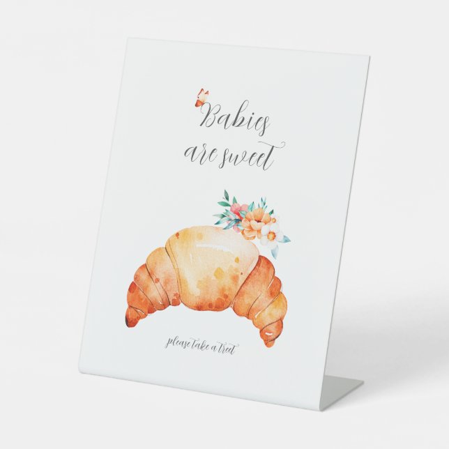 Babys sind süß nehmen eine Leckerei Croissant Part Sockelschild (Vorderseite)