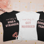 Bachelorette Party Most Likely To Dance On Tables<br><div class="desc">This funny personalized bachelorette party "Most likely to dance on tables" t-shirt is the perfect way to celebrate the bride-to-be! The playful script and modern font create a trendy look, while the spacious back design provides plenty of room for additional personalization or group names. Whether you're hitting the town or...</div>