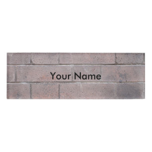 Backsteinmauer Namenschild