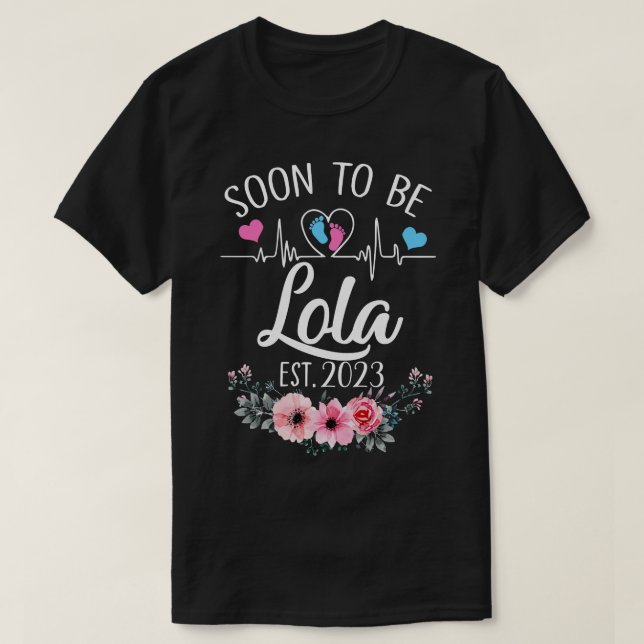 Bald wird Lola Est 2023 verkündet Blumenschwangers T-Shirt (Design vorne)