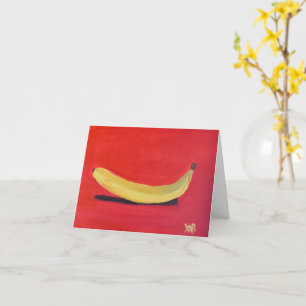 Banane mit rotem Hintergrund Karte
