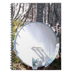 Banjo, das gegen einen Baum stillsteht Notizblock