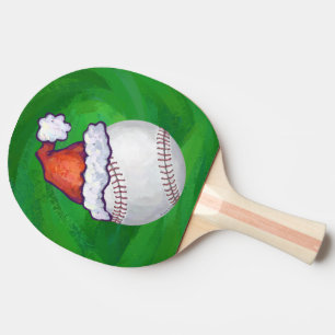 Baseball in Weihnachtsmannmütze über Grün Tischtennis Schläger