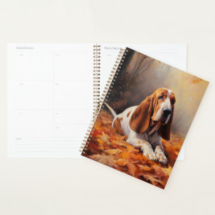 Basset Hound im Herbstlaubfall inspiriert Planer