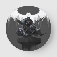 Batman Perched auf einer Säule