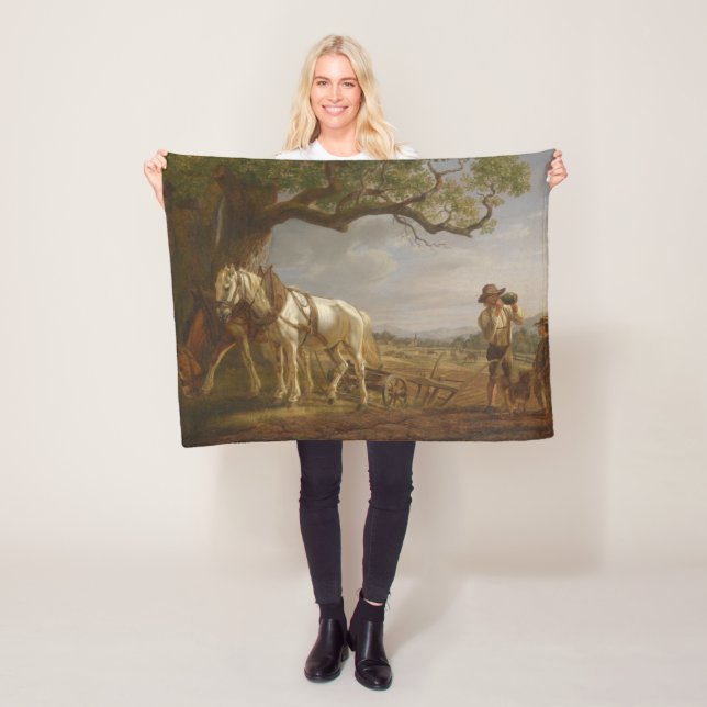 Bauer, die auf einem Feld mit Pferden und Pflug st Fleecedecke (Beispiel)