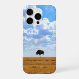 Baum auf einem geernteten Weizenfeld iPhone 16 Pro Hülle