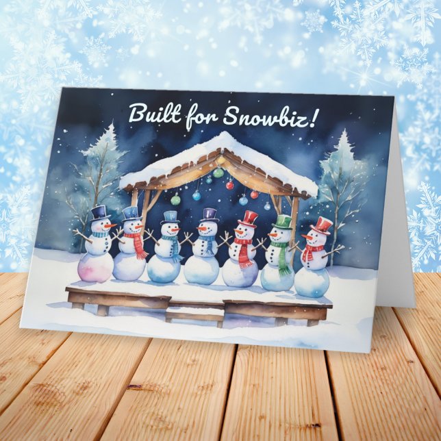 Baut für Snowbiz Funny Snowmen Weihnachten (A funny Christmas card with picture of snowmen on a wooden stage, with humorous caption)