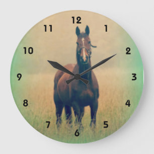 Bay Horse Standing in a Field Große Wanduhr