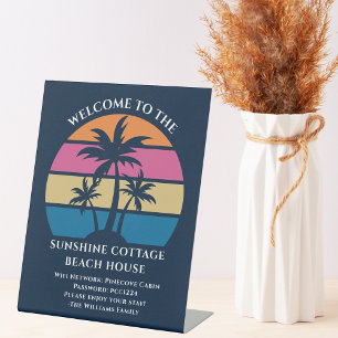 Beach House Ferien Vermietung Willkommen und Wifi Sockelschild