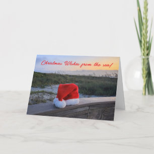 Beach Theme Ferienkarte mit Weihnachtsmannmütze Karte