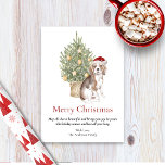 Beagle und Weihnachtsbaumhund Feiertagskarte<br><div class="desc">Diese bezaubernde Weihnachtskarte zum Thema Beagle zeigt einen Beagle mit einer Weihnachtsmannmütze,  der vor einem beleuchteten Weihnachtsbaum sitzt. Der Gruß auf der Karte lautet "Frohe Weihnachten" "Möge alles,  was schön ist und Ihnen Freude bringt,  sein diese Feriensaison und das ganze Jahr lang" und kann personalisiert sein.</div>