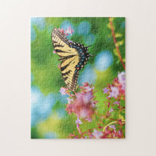 Beautiful Swallowtail butterfly on pretty flowers Puzzle