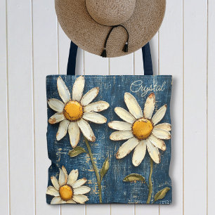 Bedruckte Jeans und Gänseblümchen