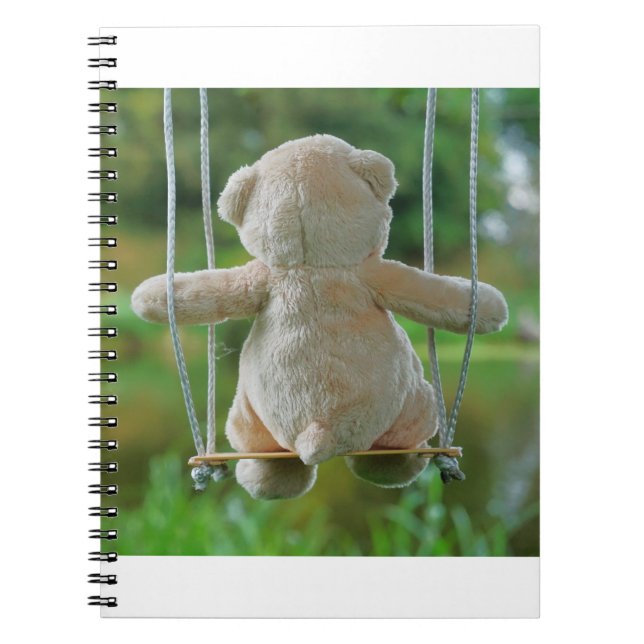 Beer op schommel vanaf de rug. notizblock (Vorderseite)