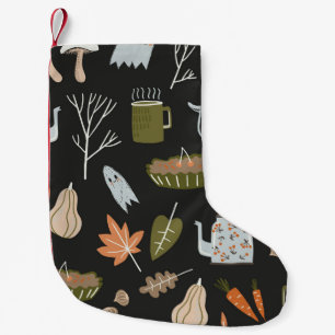 Behagliche Herbstelemente: Warmes Muster. Kleiner Weihnachtsstrumpf