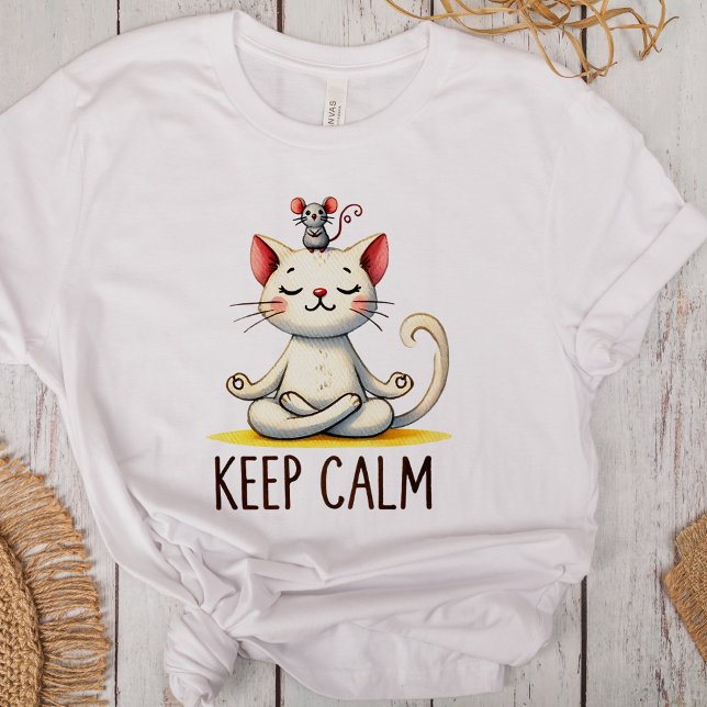 "Behalt Calm" Funny Cat Lovers Tri-Blend Shirt ("Keep Calm" Funny Cat Lovers Tri-Blend Shirt on a desk with boho decoration)