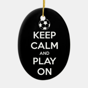 Behalten Sie Ruhe und Spiel auf schwarzer ovaler Keramik Ornament