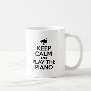 Behalten Sie Ruhe und spielen Sie das Klavier Tasse