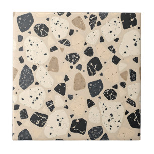Beiger schwarzer Terrazzo-Muster neutrales Abstrac Fliese