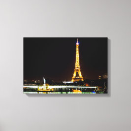 Beleuchteter Eiffelturm in Paris nachts Leinwanddruck