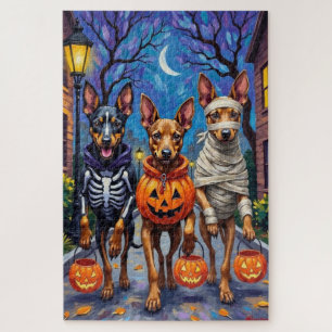 Belgische Malinois-Hunde beim Trick-or-Treat an Ha Puzzle